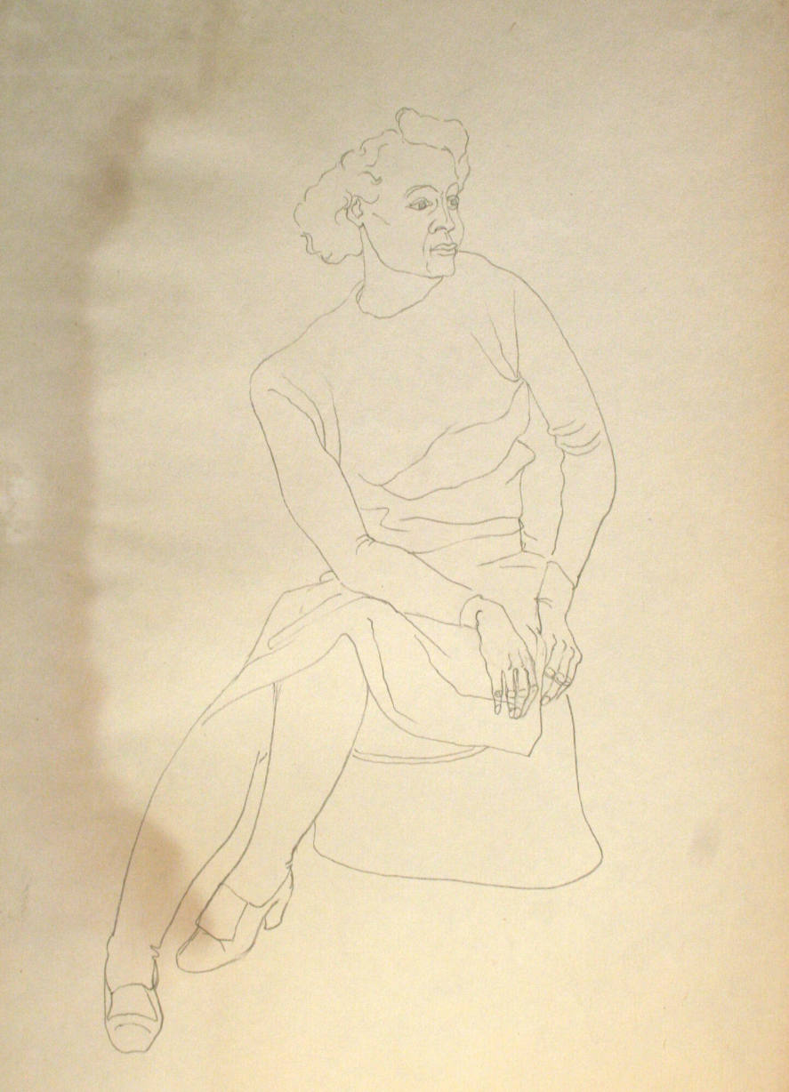 Woman seated on hassock