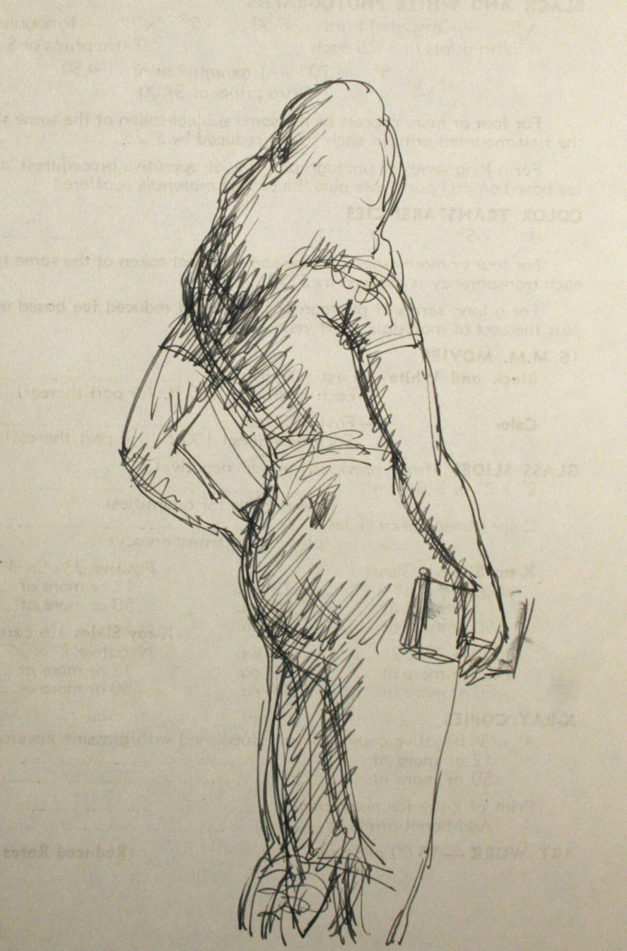 Woman with book from rear