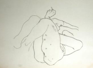 Nude woman lying down without head