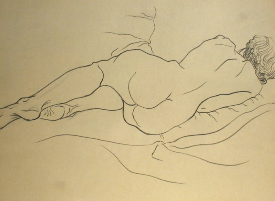 Nude woman lying down