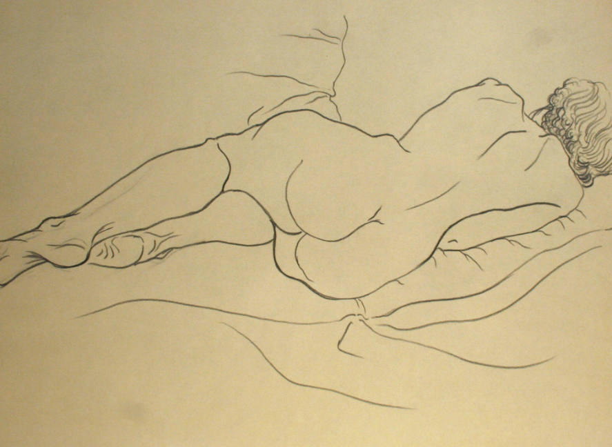 Nude woman lying down