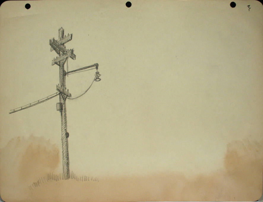 Telephone pole with street light