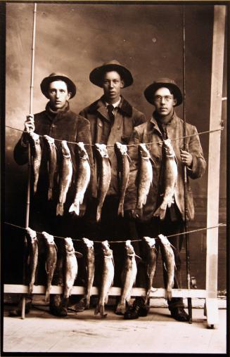 H. Buell and Two Others after a Fishing Trip