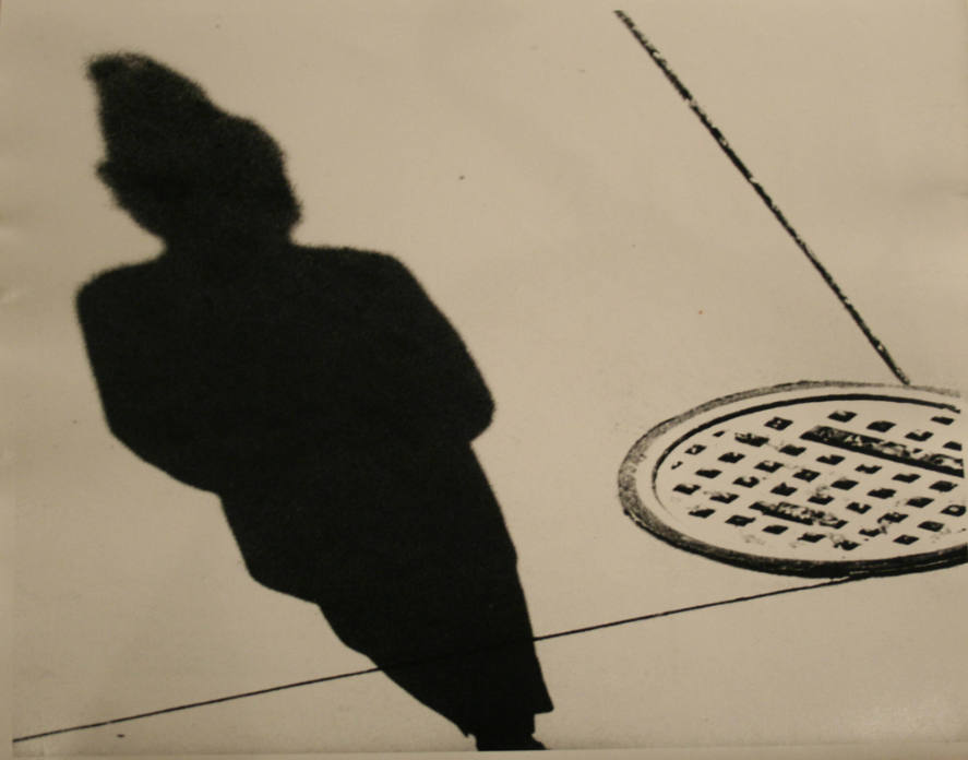 Untitled (Woman with Manhole Cover)