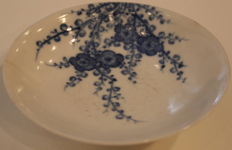 Chinese porcelain plate with white and blue flowers