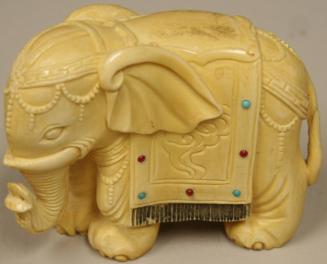 Ivory elephant with stand