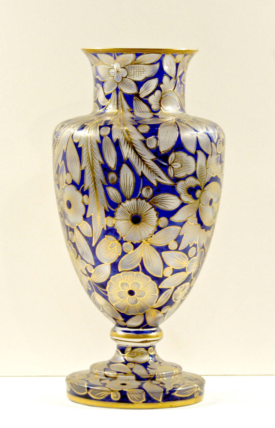 Glass vase with blue and gold flowers