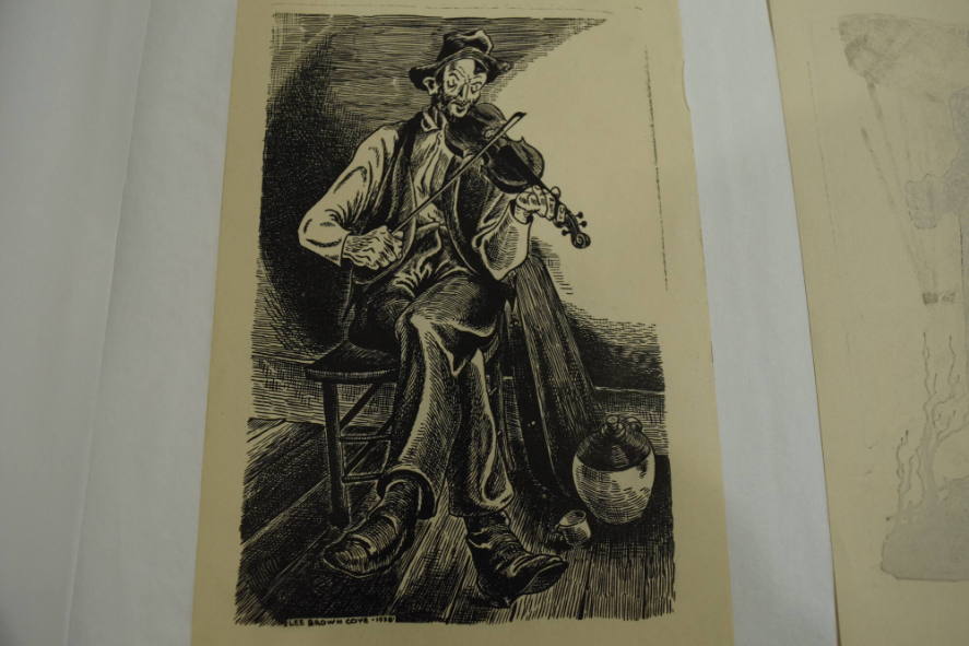 Man with fiddle and jug