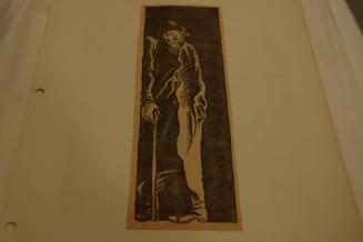 Man with long coat and cane