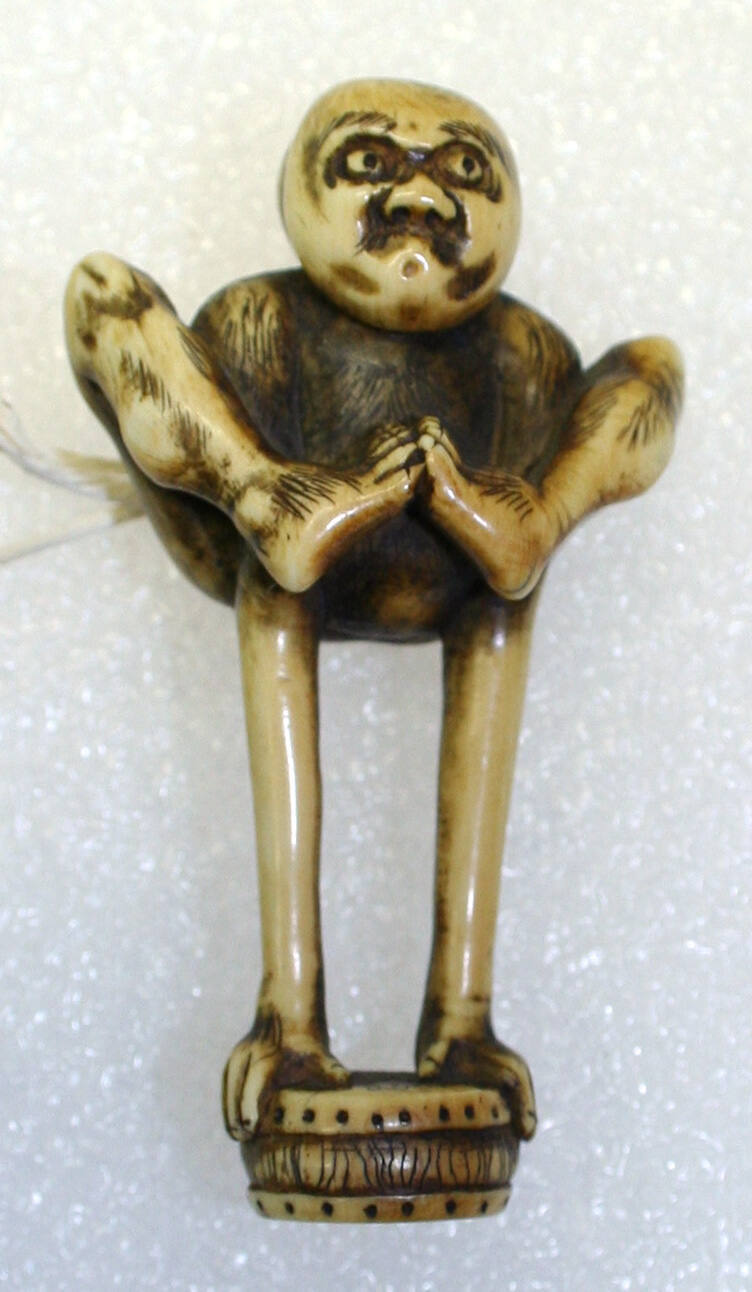 Netsuke of Ashinaga with Mask