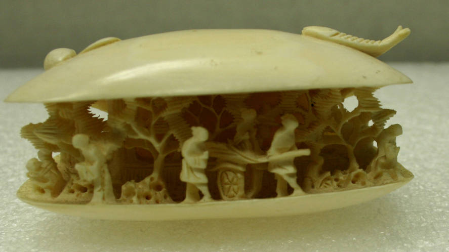 Carved ivory clam shell and stand